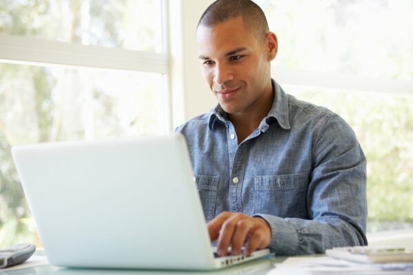 man working on laptop