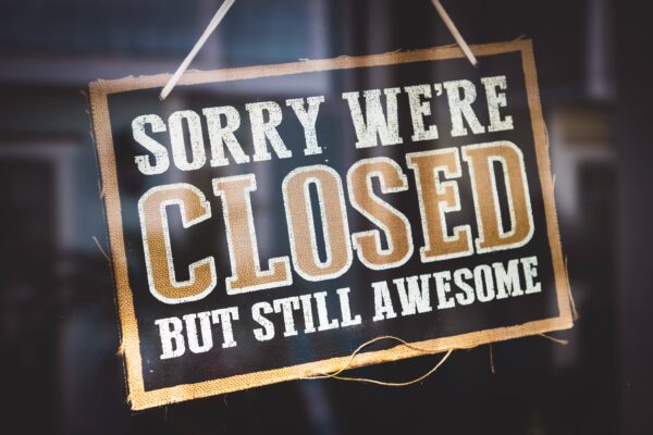 small business sign reading "sorry we're closed, but still awesome"