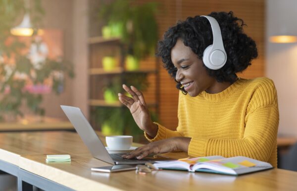 freelancer talking to a client on laptop