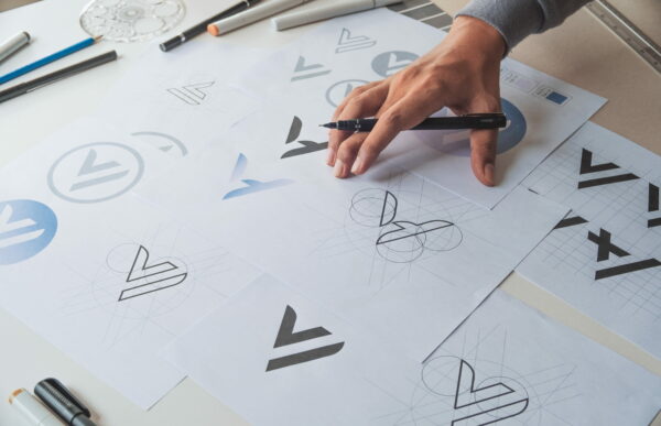 graphic designer presenting logo variations