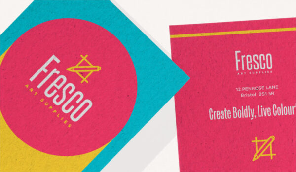 A business card paper example showing a kraft paper texture, with pink, blue, and yellow branding